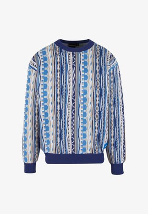 Adīta džemperis ar vertikālām svītrām zilās, bēšās un baltās krāsās. Ribots apkakles un piedurkņu dizains, mīksts teksturēts materiāls.