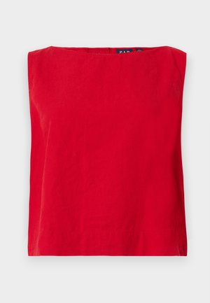 Punainen lyhythihainen paita, jossa on neliön muotoinen kaula-aukko, valmistettu kevyestä puuvillasta. Paidassa on sileä pinta ja suora helma.