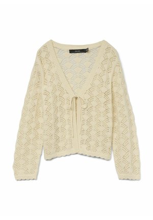Kreminės spalvos megztinis kardiganas su geometriniu atviru raštu, turintis v-kaklą ir užsegimą su juostele priekyje. Skaldyta apatinė dalis.