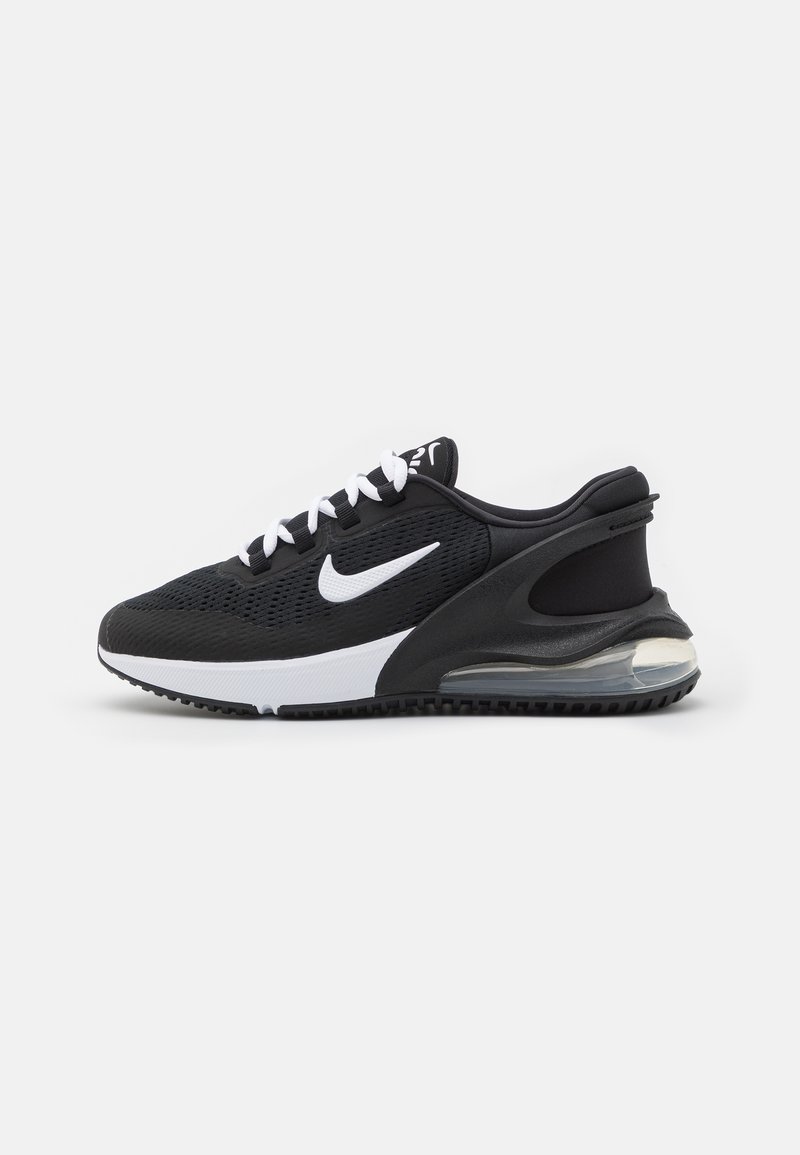 Black athletic shoe with a mesh upper, white accents, and a visible air unit in the heel. Features white laces and textured rubber outsole.