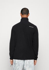 Oakley ALPINE FULL ZIP  - Casaco polar - blackout