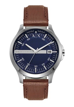 Armani Exchange wristwatch with blue textured dial, silver markers, date display at 3 o'clock, and brown leather strap, showing 10:10:36 time.