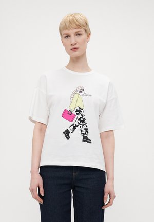 White t-shirt featuring a graphic illustration of a figure in patterned pants carrying a pink handbag. Short sleeves, relaxed fit.