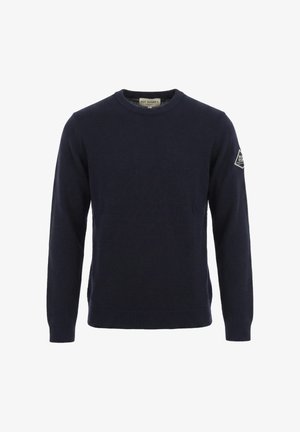 Maglione blu navy girocollo con maniche lunghe, polsini e orlo a costine e una piccola toppa con logo sul braccio sinistro superiore.