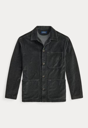 Dunkelgraue Kordjacke mit Knopfleiste, Kragen und drei Fronttaschen, eine auf der Brust und zwei an der Taille.