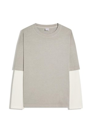 Gray short-sleeve T-shirt layered over a white long-sleeve shirt, laid flat on a white background.