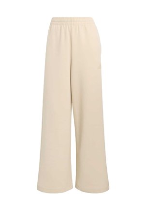 Beige Hosen mit weitem Bein und elastischem Bund. Hergestellt aus weichem Material, mit einem kleinen Logo an der Seite. Geeignet für den Freizeitgebrauch.