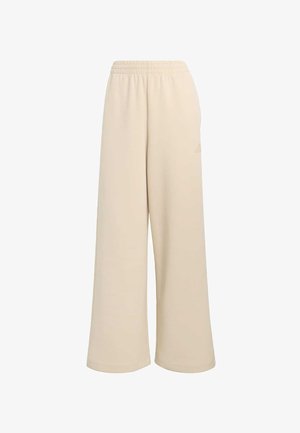 Beżowe spodnie o szerokich nogawkach z elastycznym pasem. Wykonane z miękkiego materiału, z małym logo po boku. Odpowiednie do codziennego noszenia.