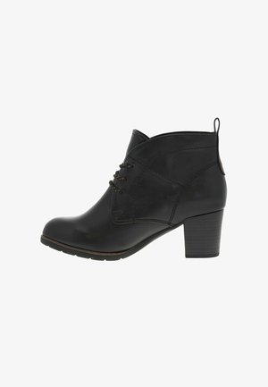 Bottines noires avec une finition en cuir lisse, un design à lacets et un talon empilé. Présente une languette à l'arrière pour un enfilage facile.