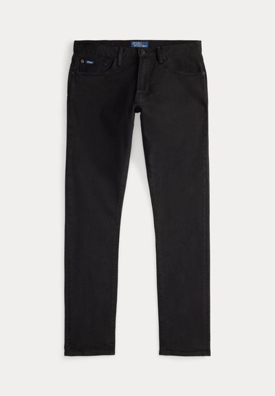 Svarte denimjeans med slank passform, som har fem lommer, beltehemper og en blå merkelapp på linningen. Glatt, slitesterkt stoff.