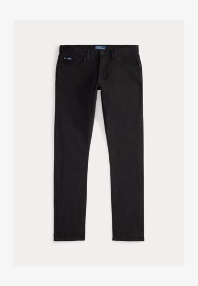 Svarte denimjeans med slank passform, som har fem lommer, beltehemper og en blå merkelapp på linningen. Glatt, slitesterkt stoff.