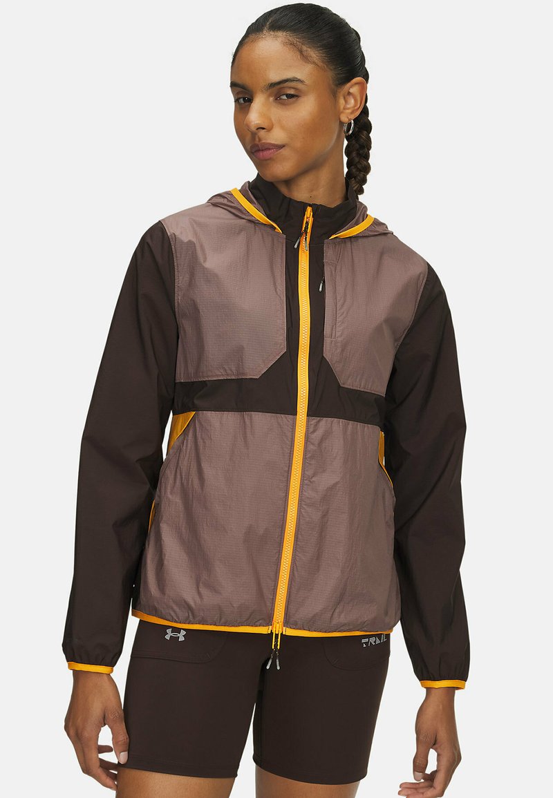 Brown and purple lightweight jacket with a hood, features yellow accents and a zippered front. Made from a smooth, water-resistant material.