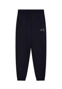 Zwarte joggingbroek met elastische tailleband, taps toelopende benen en zwarte ribbels aan de onderkant. Bevat een wit logo aan de linkerzijde. Gladde stoftextuur.
