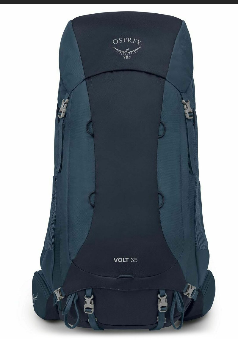 Mochila Osprey Volt 65 en azul oscuro, con múltiples bolsillos, correas ajustables y un tejido duradero con paneles laterales de malla y detalles del logo.