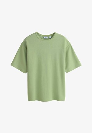 Maglietta a maniche corte di colore verde chiaro, con scollo rotondo e maglia lavorata a maglia, con vestibilità comoda e trama semplice, mostrata su sfondo bianco.