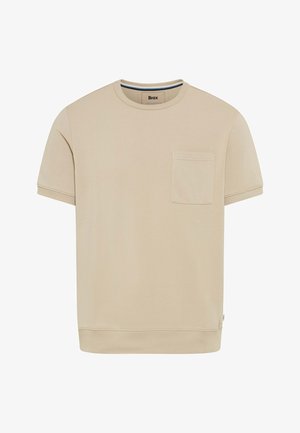 Beige kortærmet T-shirt med rund hals og brystlomme samt ribbet kant, vist på hvid baggrund.