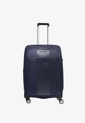 Valigia blu navy con forma strutturata, tessuto testurizzato e pannello frontale liscio. Dotata di manico telescopico e quattro ruote per la mobilità.