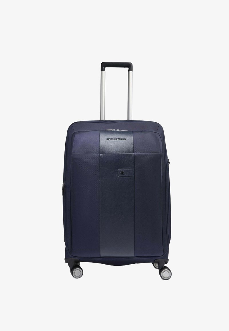 Marineblaue Koffer mit strukturierter Form, strukturiertem Stoff und glatter Frontplatte. Verfügt über einen Teleskopgriff und vier Räder für Mobilität.