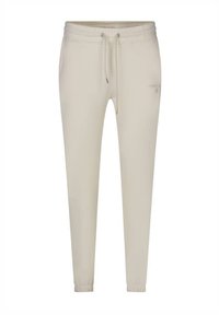 Pantalons jogger beige clair en tissu doux, dotés d'un waistband élastique avec cordon de serrage, de poignets ajustés et d'un détail logo subtil.