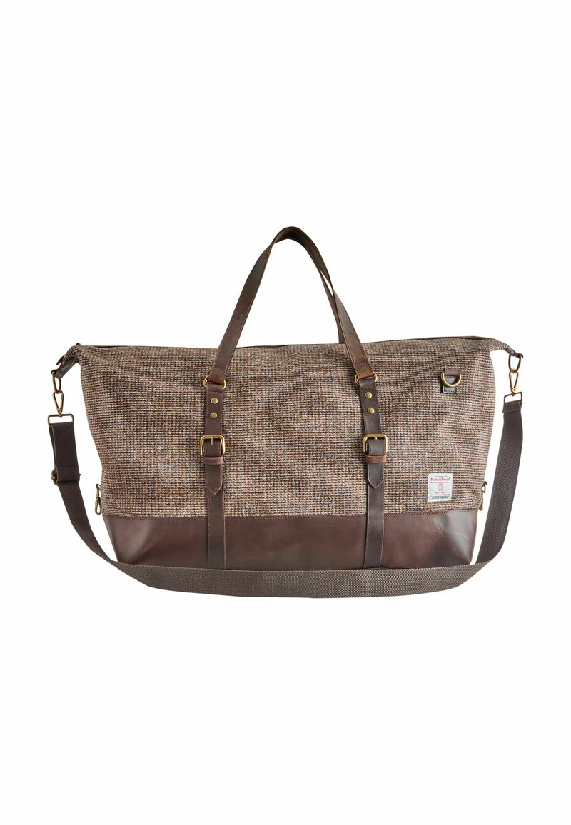 Brown fabric duffel bag with leather trim, featuring two sturdy handles, an adjustable shoulder strap, and a textured woven pattern.