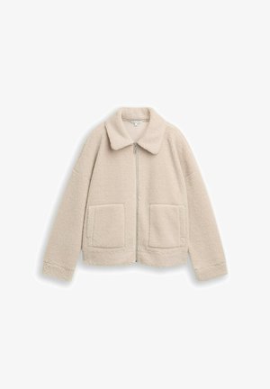 Beige fleecejack met volledige ritssluiting aan de voorkant, brede kraag, lange mouwen en twee grote opgestikte zakken aan de voorkant.