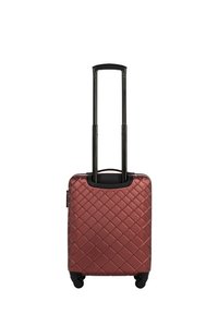 Hard-shell suitcase in burgundy with diamond-patterned texture, retractable black handle, and four black wheels for mobility.