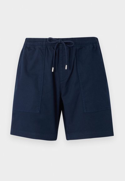 Shorts bleu marine en tissu léger, dotés d'une taille élastique avec cordon de serrage et de deux poches latérales. Texture lisse.