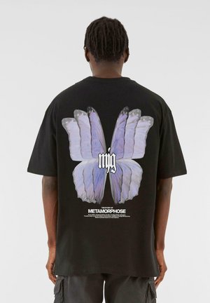 TRANSFORMATION - Print T-shirt - black
