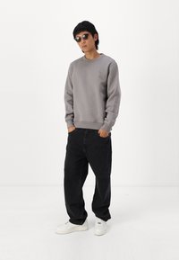 Hollister Co. Vrečaste kavbojke - washed black