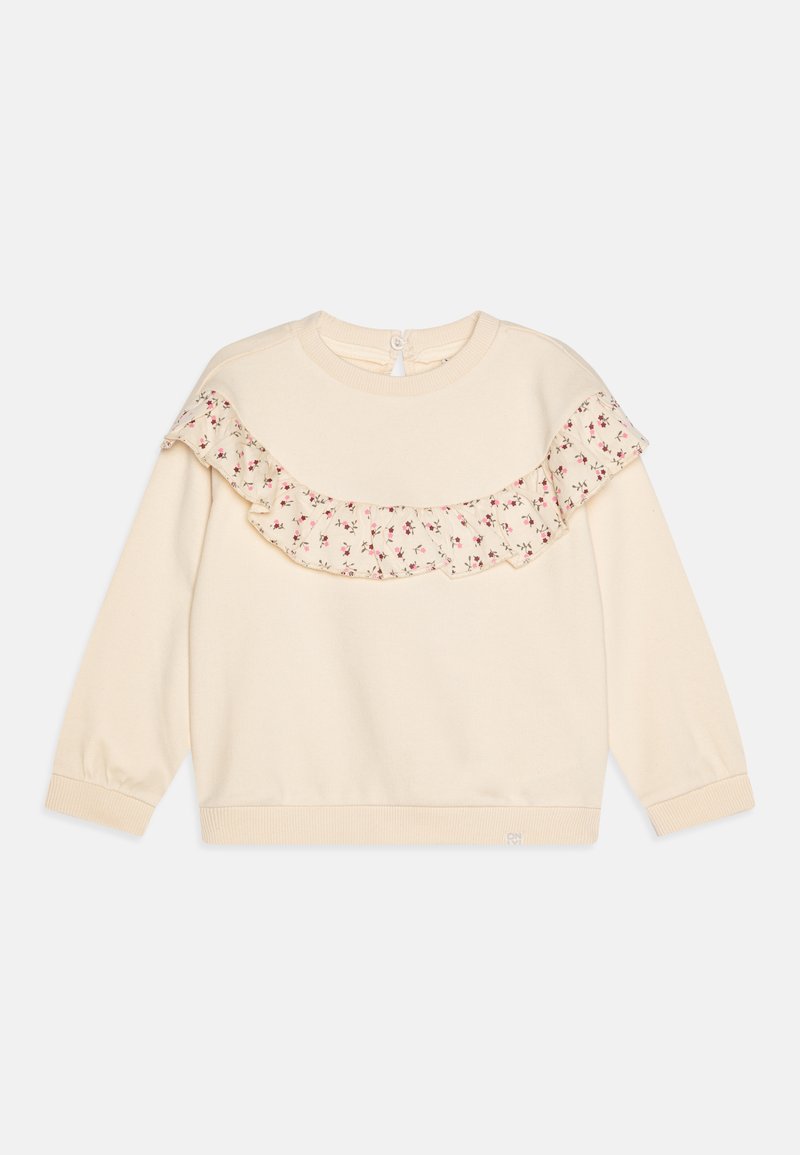 Krémová mikina s květinovým volánkovým výstřihem, dlouhými rukávy a zapínáním na knoflík na zadní straně. Měkká textura, žebrované manžety a pas.