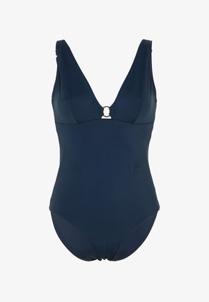 Costume intero blu navy con scollo a V profondo e piccolo anello metallico al centro davanti.