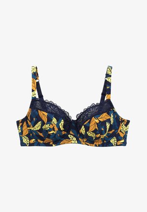 Soutien-gorge à armatures avec une base bleu marine et un motif de feuilles multicolores en jaune et orange. Dentelle le long des bonnets et bretelles réglables.