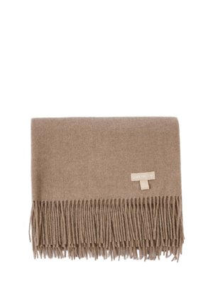 Weicher beiger Wollschal mit fransigen Enden und einem kleinen Stoffetikett an einer Seite.