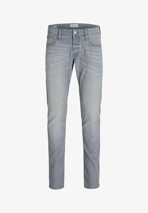 Ljust grå slim-fit denimjeans med frampärmknapp, dragkedja, bälteshällor och femfickdesign, uppvisade mot en vit bakgrund.