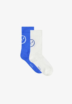 Bavlnené ponožky v modrej a bielej farbe. Modrá ponožka obsahuje kruhovú usmiatu tvár, zatiaľ čo biela ponožka má vytlačené slovo "Muži" v modrej farbe.