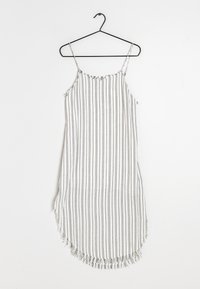 Raidallinen hihaton mekko mustalla ripustimella. Kevyestä kankaasta valmistettu, harmaita ja valkoisia pystysuoria raitoja, jossa on fringed-helma.