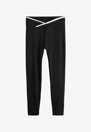 Black leggings with a soft, stretchy fabric featuring a crisscross white band at the waistband. Smooth texture and fitted design.