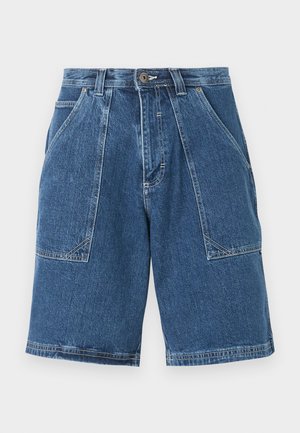 Sinised teksast põlveni ulatuvad lühikesed püksid, esiküljel paiknevate plaastritaskute, vööaasade, nupuga kinnituse ja nähtavate õmblusedetailidega.