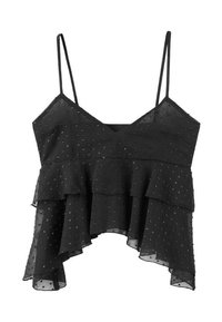 Svart cami-top med tunna axelband, lager-på-lager volangdesign och prickig textur. Lätt material med subtil glans och lekfull rörelse.
