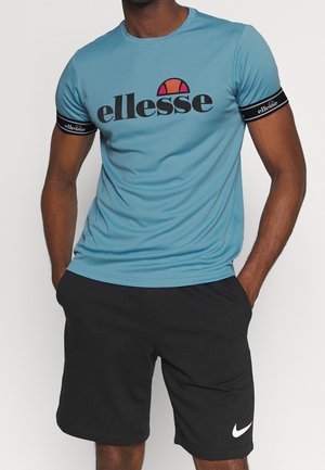 Triko s potiskem - light blue