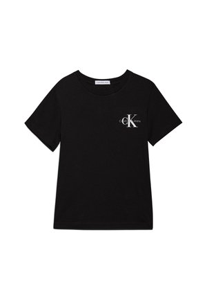 T-shirt noir en coton avec un col rond, des manches courtes et un petit logo Calvin Klein blanc sur le côté gauche de la poitrine.
