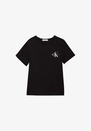 Svart bomull T-skjorte med rund hals, korte ermer og en liten hvit Calvin Klein-logo på venstre bryst.