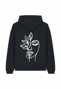 Il felpa nera presenta un design di arte lineare bianco di un volto intrecciato con foglie, che mette in risalto uno stile minimalista e una texture liscia.