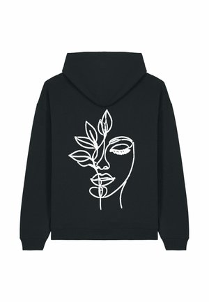 Le sweat à capuche noir présente un design en art linéaire blanc d'un visage entrelacé avec des feuilles, mettant en valeur un style minimaliste et une texture lisse.