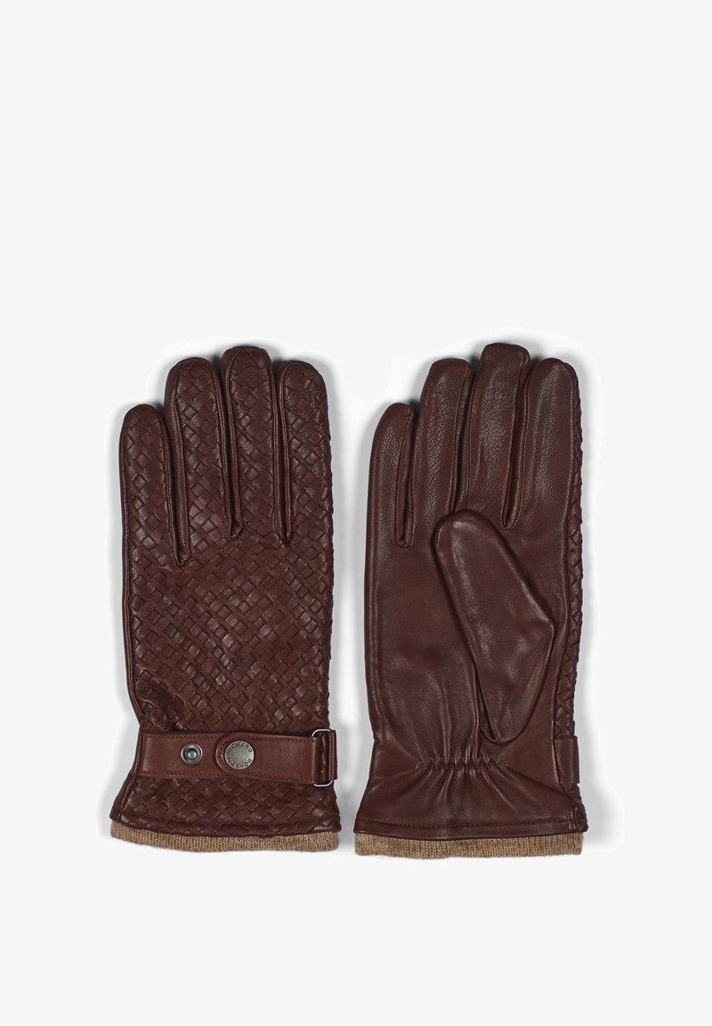 Guantes de cuero marrón que presentan una textura tejida de un lado y un acabado suave del otro, correa ajustable con un acento metálico y forro de muñeca de punto.