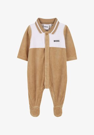 Combinaison en polaire marron et blanc avec manches courtes, col, boutons-pression et logo. Pieds couverts, texture douce, design décontracté.