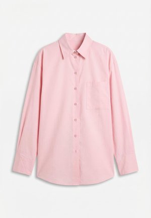 Light pink long-sleeve button-up shirt with pointed collar, front chest pocket, and buttoned cuffs, displayed on a white background.