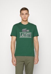 Lacoste UNISEX - Camiseta estampada - vert