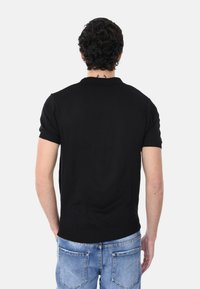 Ciabalù Polo - nero