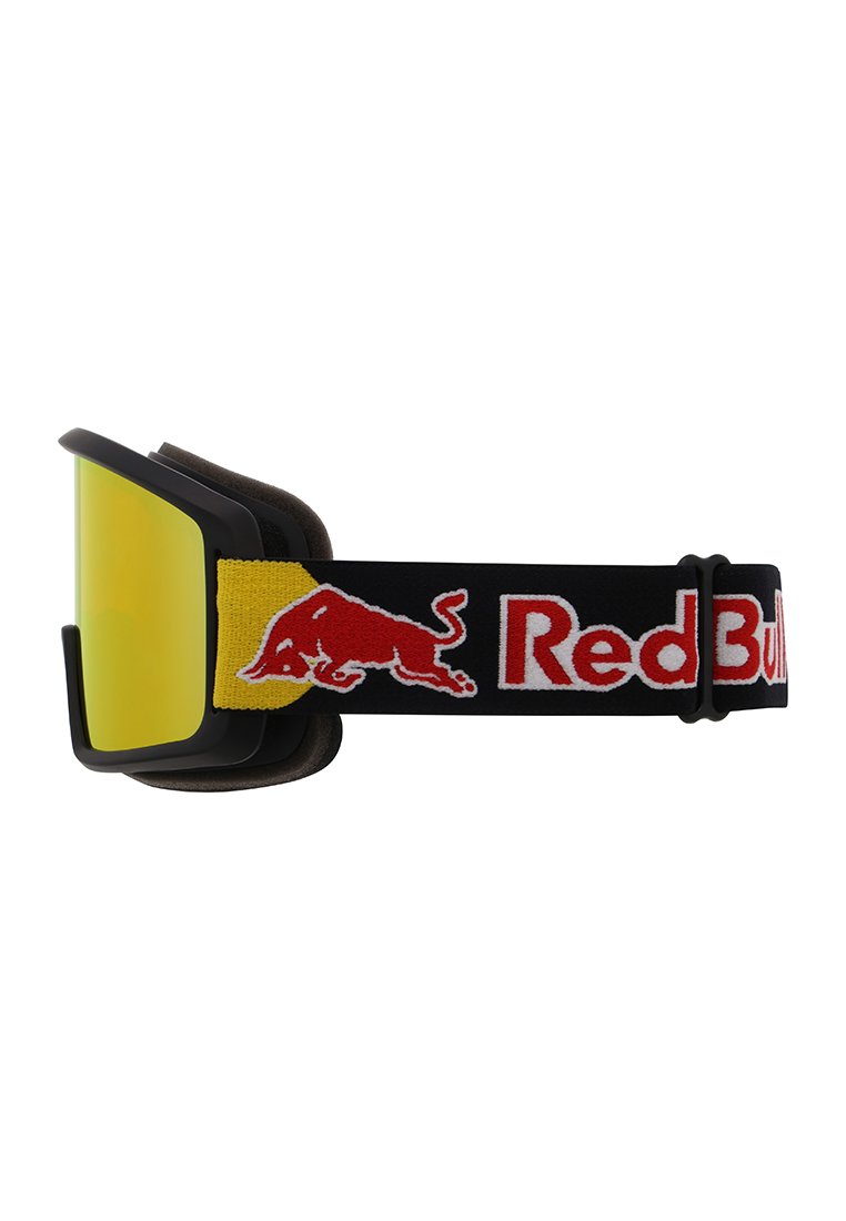 Skibrille mit einer großen gelben Linse, schwarzem Rahmen und einem weichen Band mit einem roten und gelben Red Bull-Logo auf schwarzem Hintergrund.
